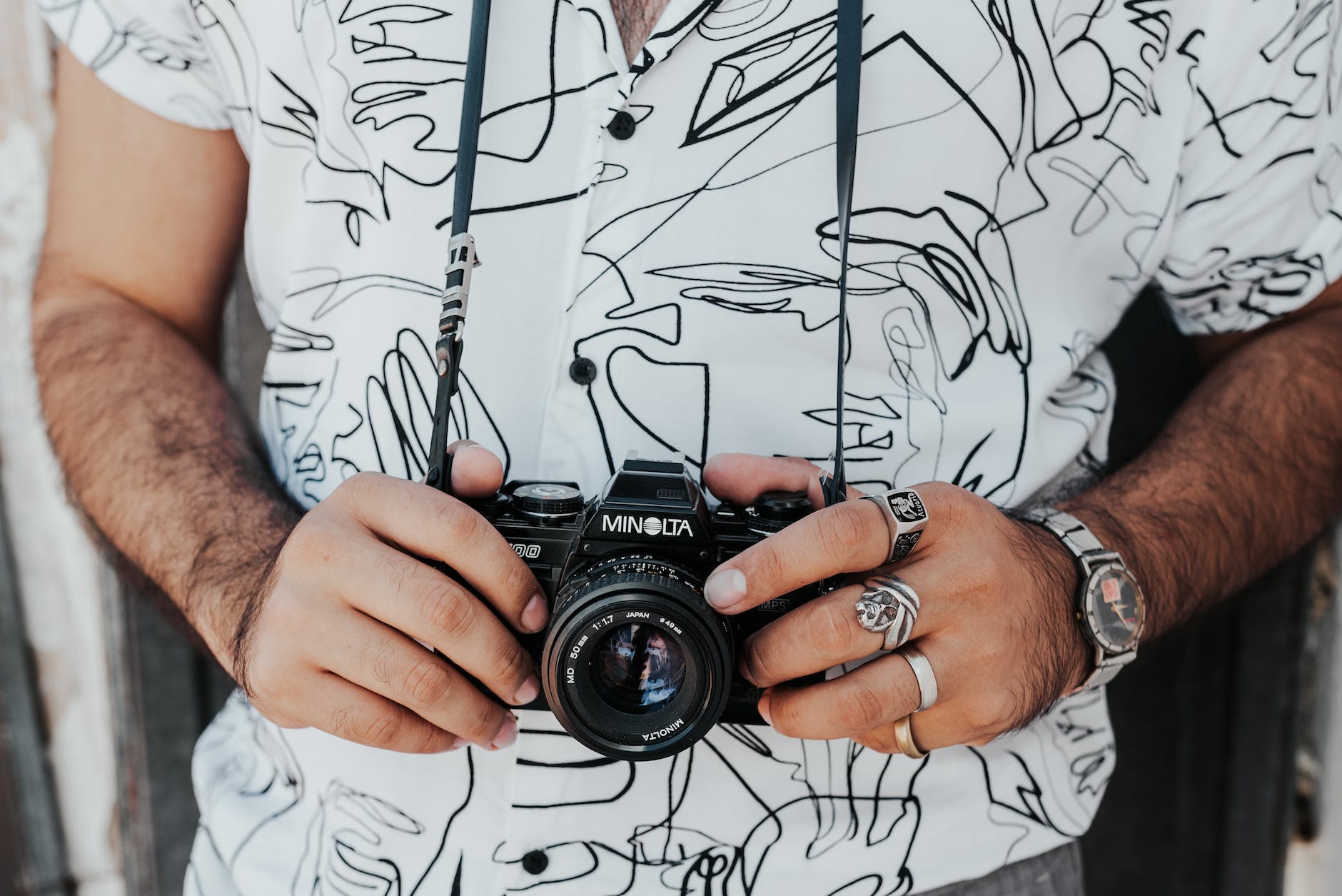crop man with photo camera